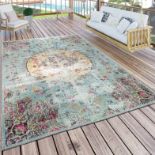 Oriental Turquoise RugThis Turquoise And Pink Rug Features Oriental-Style Motifs As Well As Both