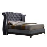 Grande Upholstered Bed Frame Presenting A Grand Buttoned Headboard With Curved Hotel Style Wings And