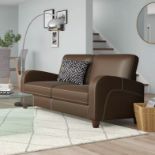 Sleek 3 Seater Sofa This 3-Seater Sofa With Its Sleek Design And Faux Leather Upholstery Is An Eye-