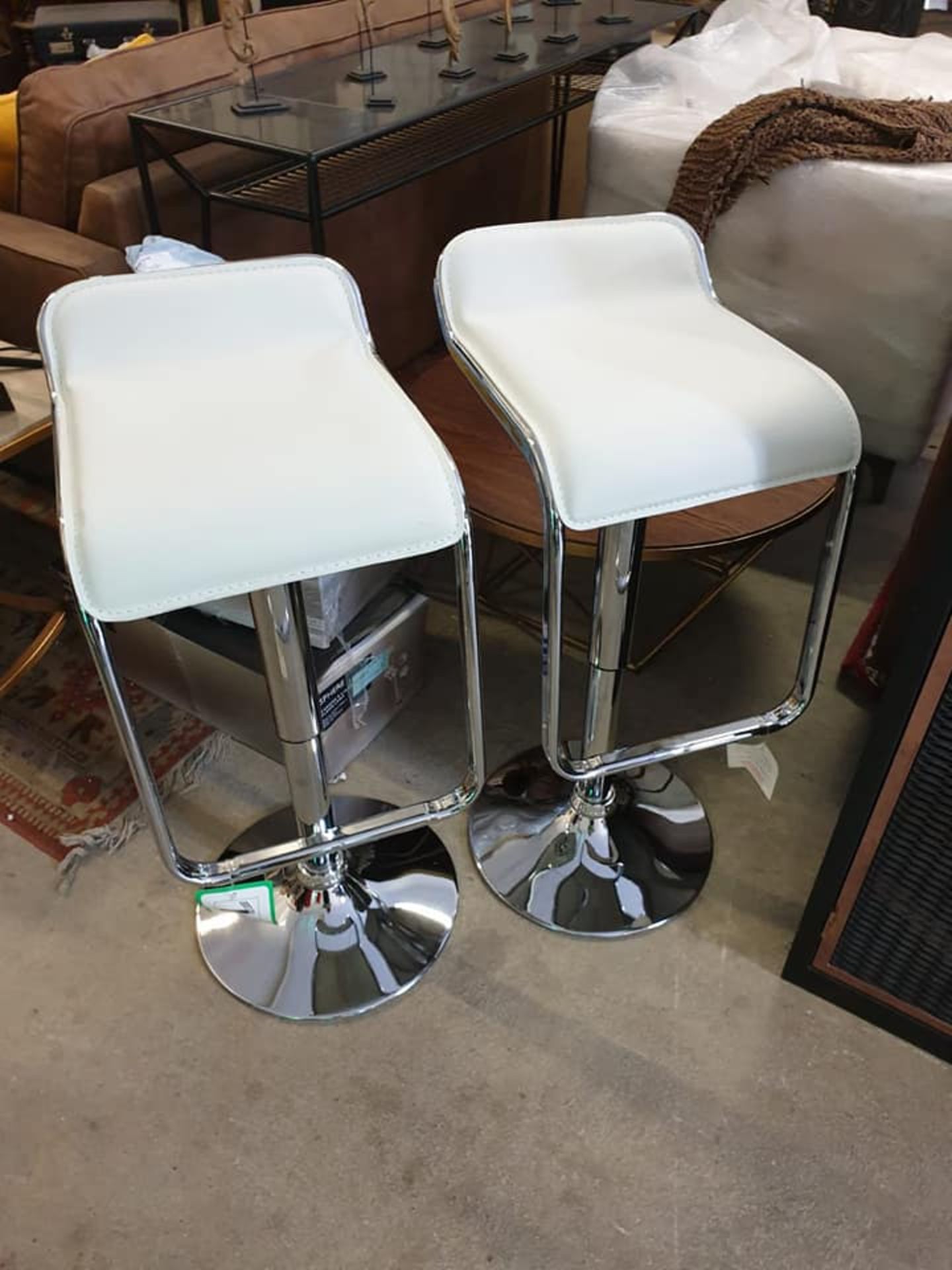 A Pair Of White Leather Adjustable Height Chrome Breakfast Bar Stools With Footrest 43cm Pitch