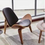 Leather Chair This chair unites simplicity and clean lines with a minimalist design to bring harmony