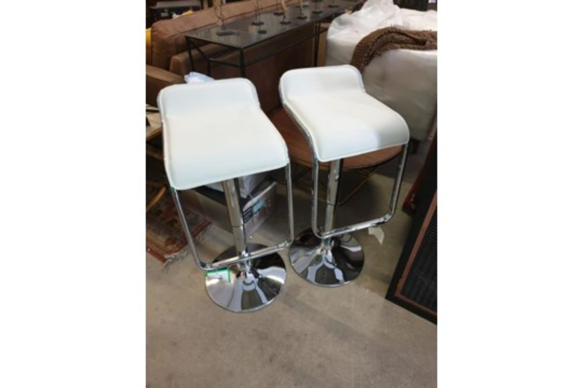 A Pair Of White Leather Adjustable Height Chrome Breakfast Bar Stools With Footrest 43cm Pitch