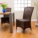 A Pair Of Lloyd Loom Chairs