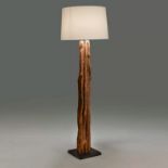 Adele Floor Lamp embraces rustic living and lets you indulge in the warmth of wood with its