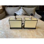 A pair of Eichholtz table lamps square laminated yellow and black on plinth ( shades not supplied)