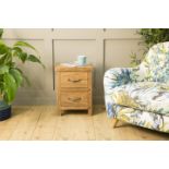 A Pair of Soho Solid Wood Bedside 2 Drawer Bedside Table will complement your bedroom scheme