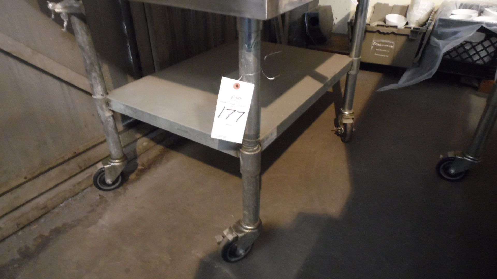 STAINLESS ROLLING TABLE 36" X 28"