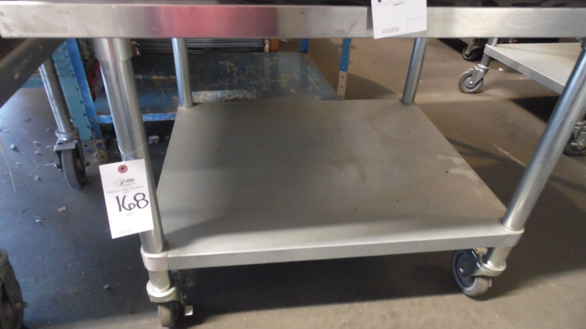 STAINLESS ROLLING TABLE 3FT. X 2FT. 8"