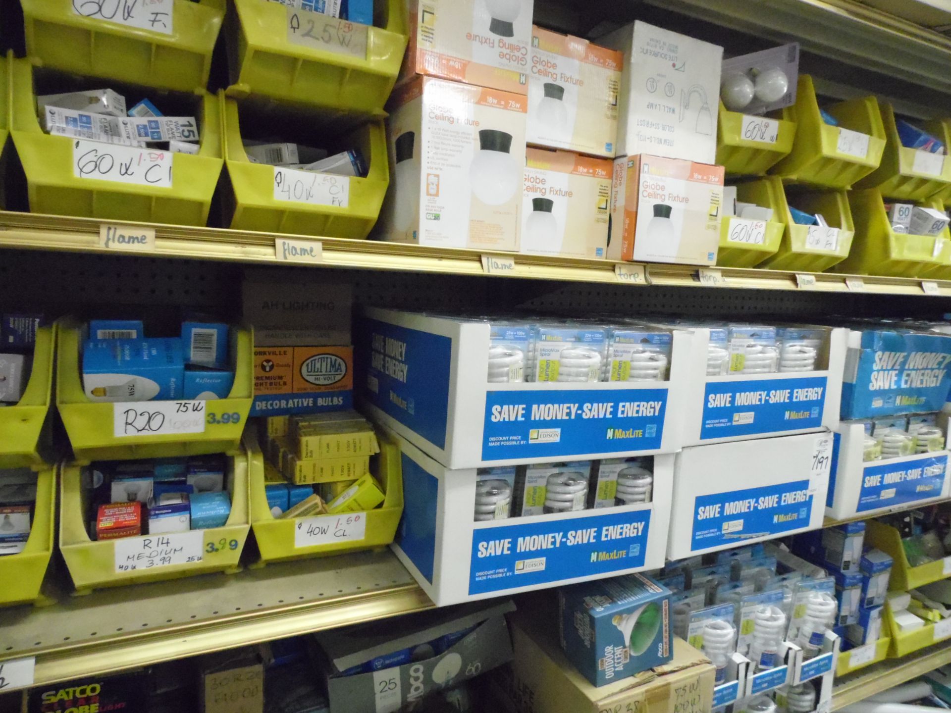 ASSORTED LIGHT BULBS ON SHELF