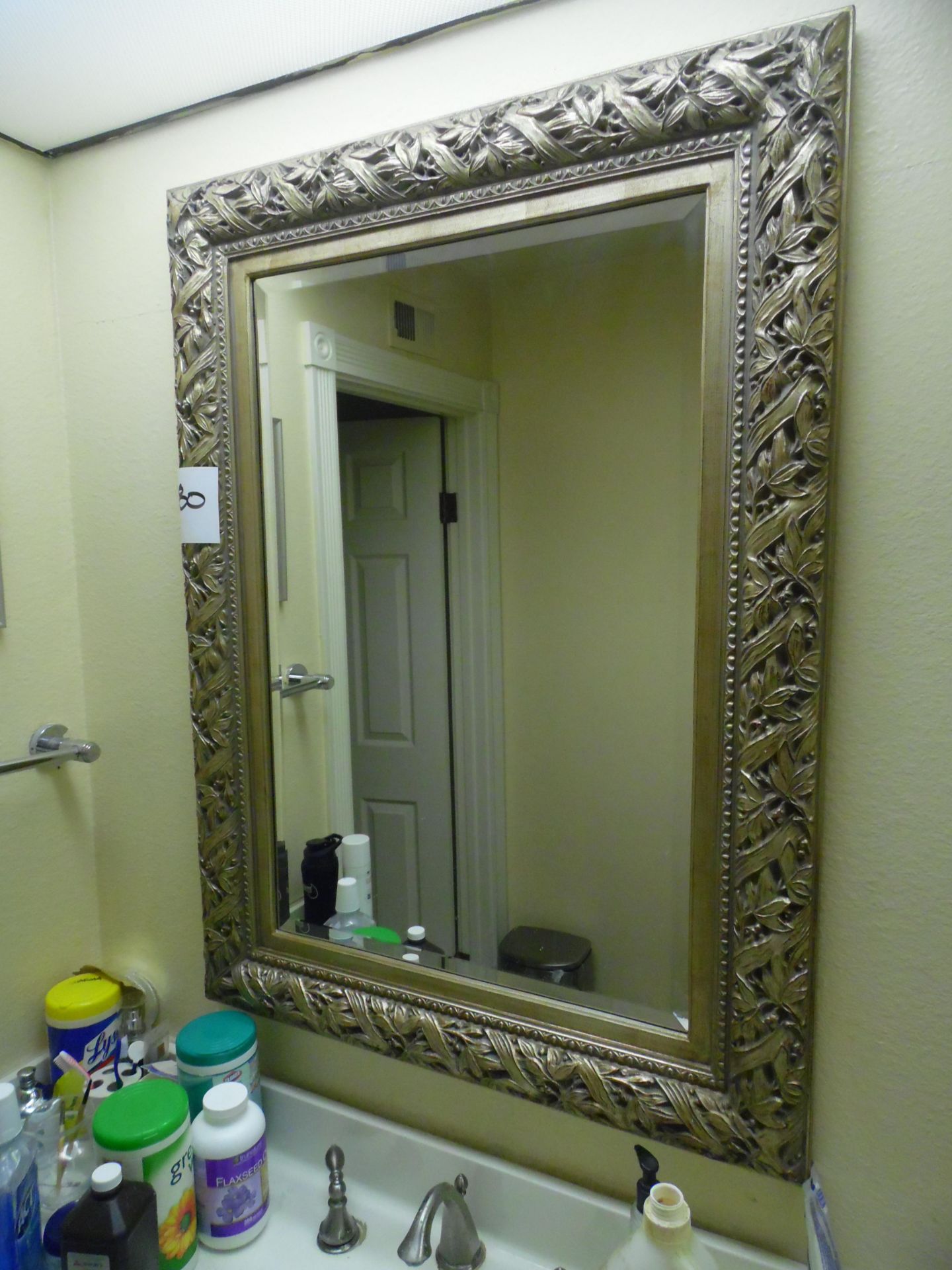 BEVELLED MIRROR IN BATHROOM