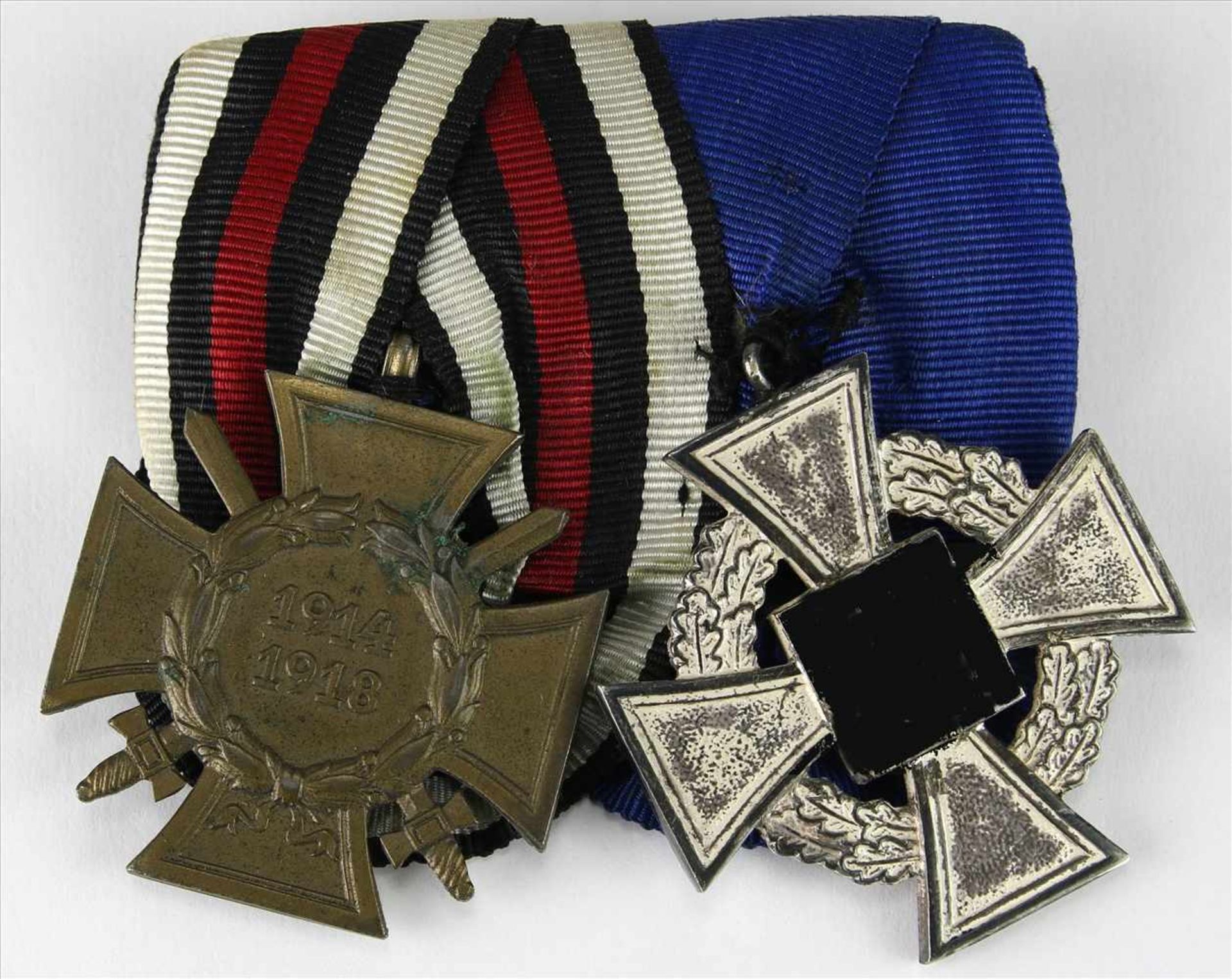 Ordensspange III. ReichVerdienstmedaille und eine weitere aus WK I. Größe ca. 40 bzw. 38 mm.