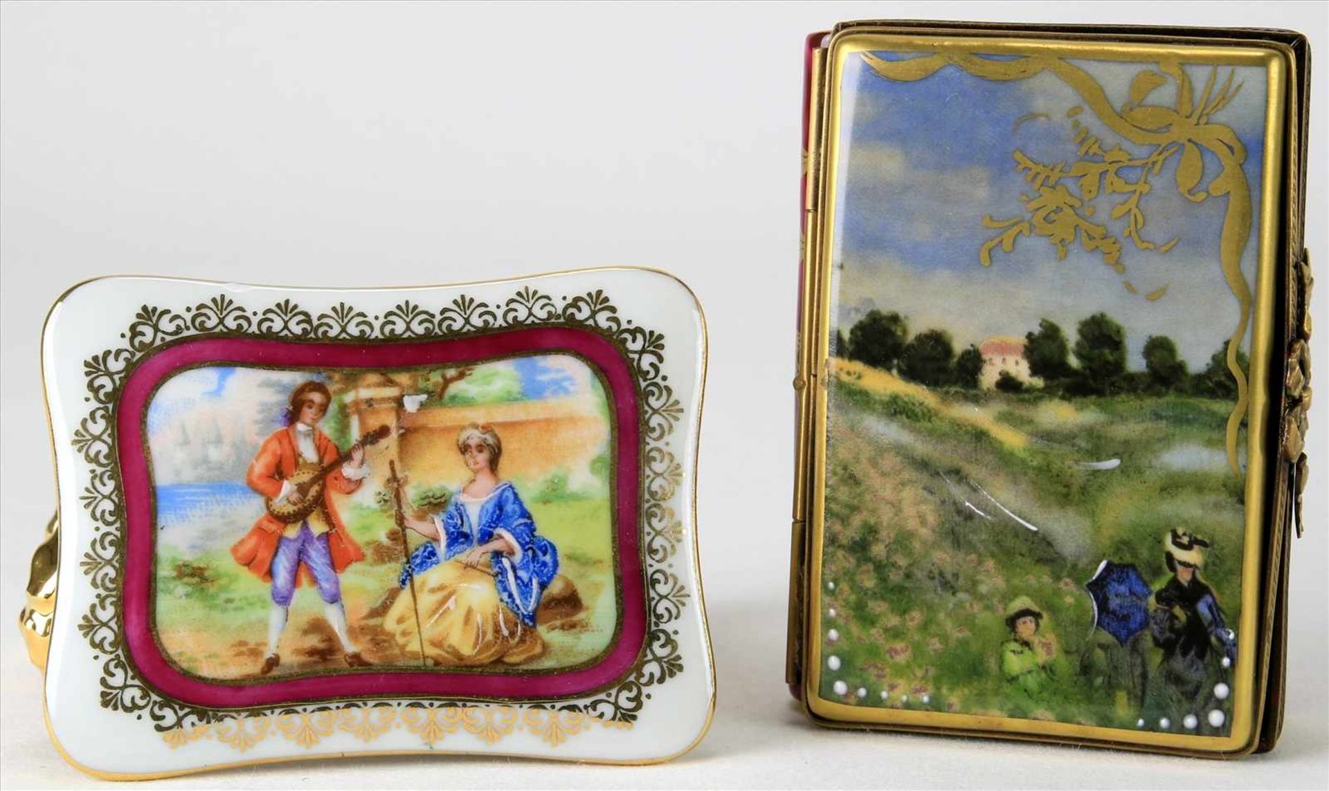 Zwei ZierdöschchenLimoges 20. Jh. Porzellan mit Goldstaffage und gemaltem bzw. Druckdekor. Gedruckte