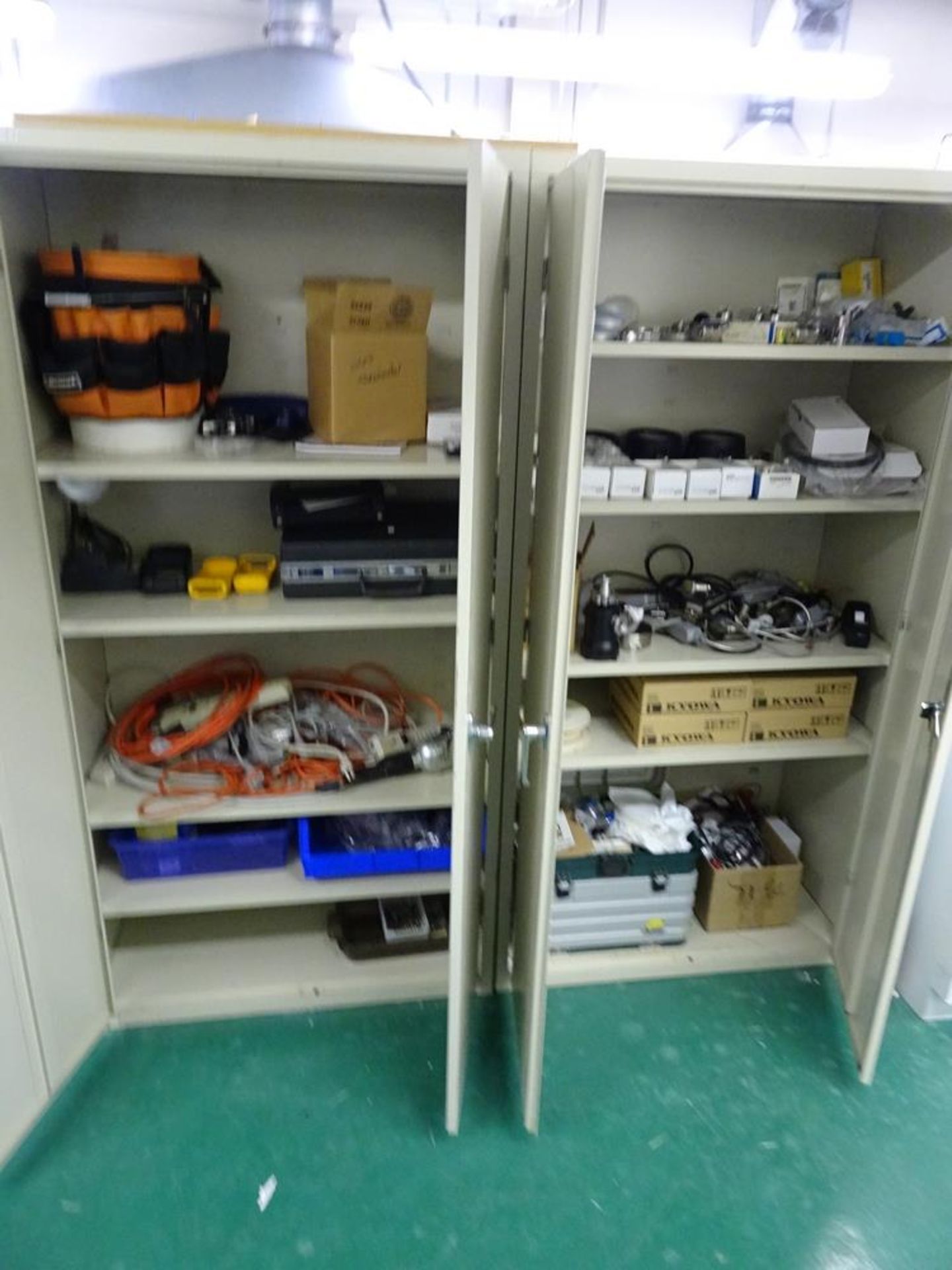 (1) Lot of 2, Two-Door Metal Storage Cabinets and Contents Including But Not Limited to: Quantity of