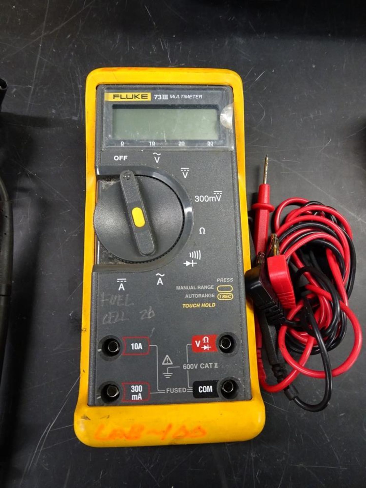 (1) Fluke Model 73 III Digital Handheld Multimeter With Associated Case And Leads