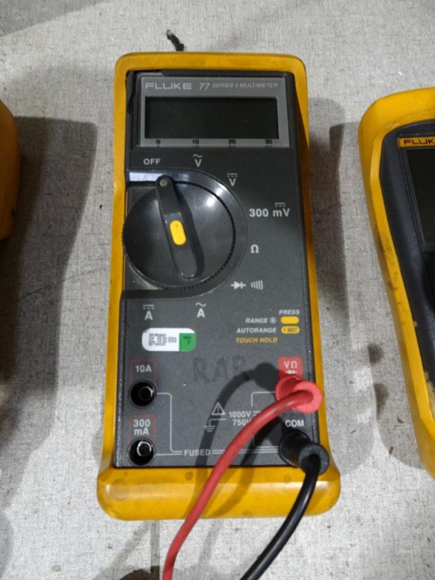 (1) Fluke Model 77, Series II Digital Handheld Multimeter With Associated Leads And Case