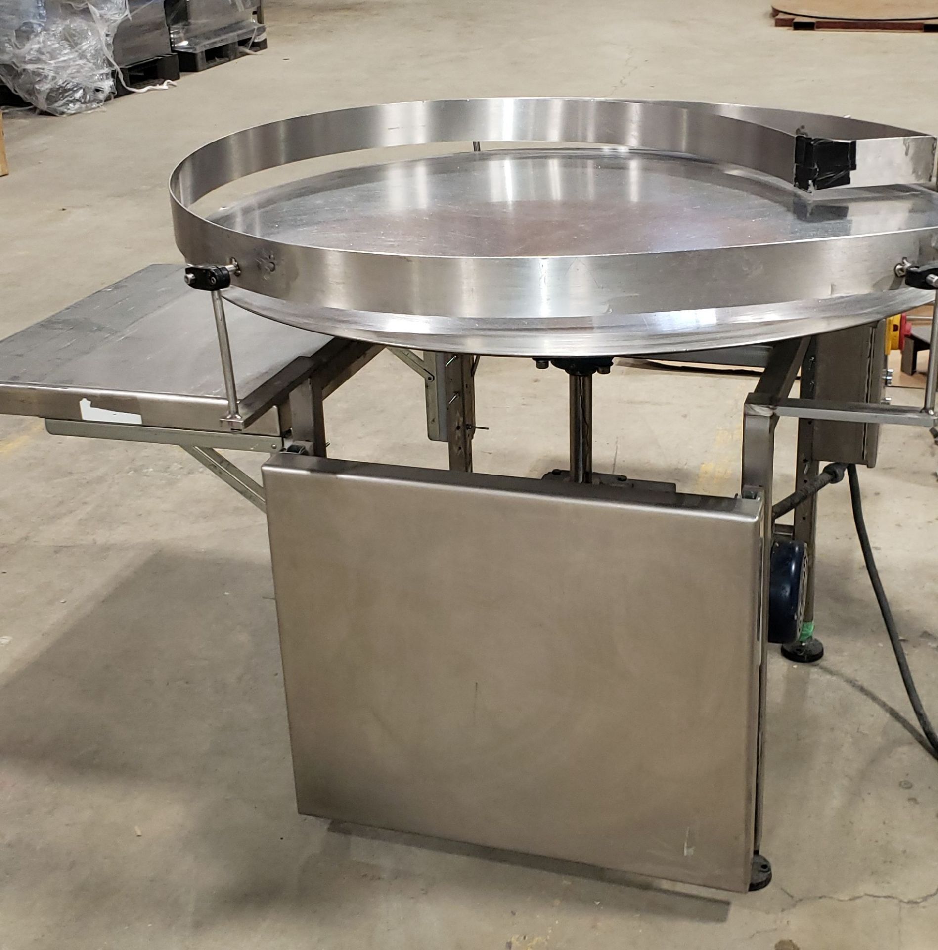 48" Stainless Steel Turntable with guards, controls & pack-off Table