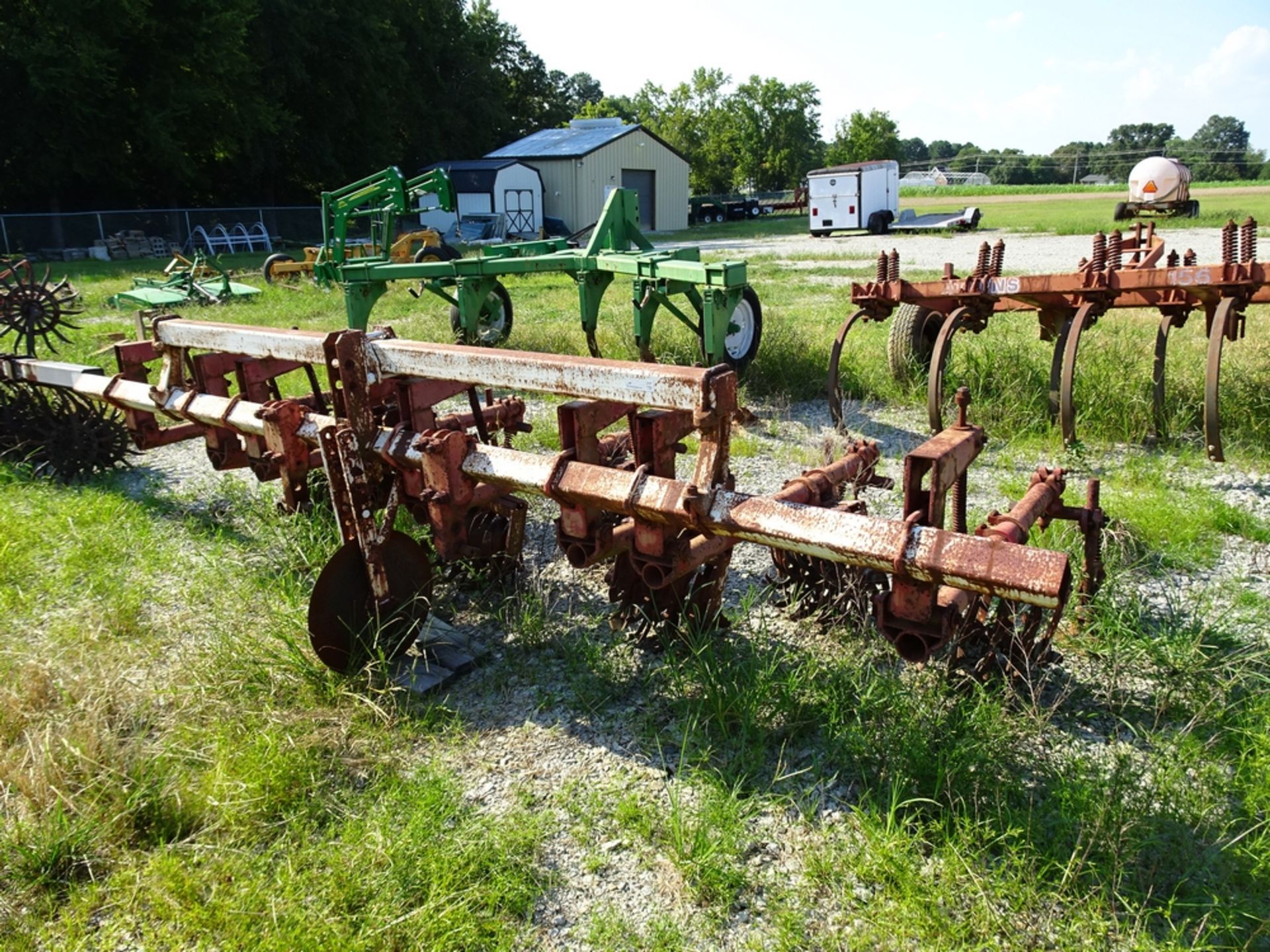 International Harvester 4 row tine cultivator with depth wheel and Class 2 3 point hitch