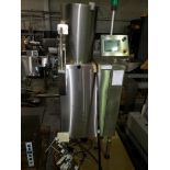 DT Kalish desiccant feeder, model 8331,designed for barrel canisters, with rotary bowl feeder and