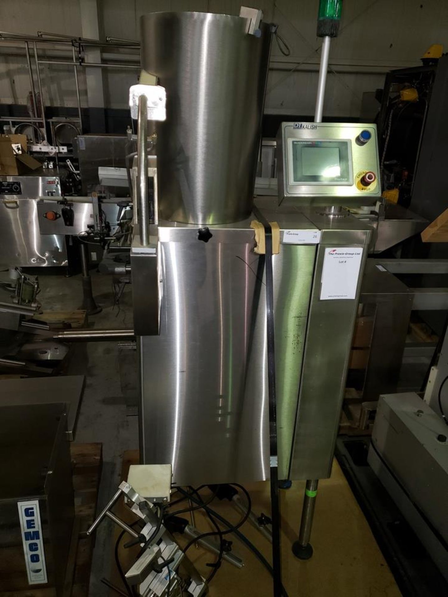 DT Kalish desiccant feeder, model 8331,designed for barrel canisters, with rotary bowl feeder and