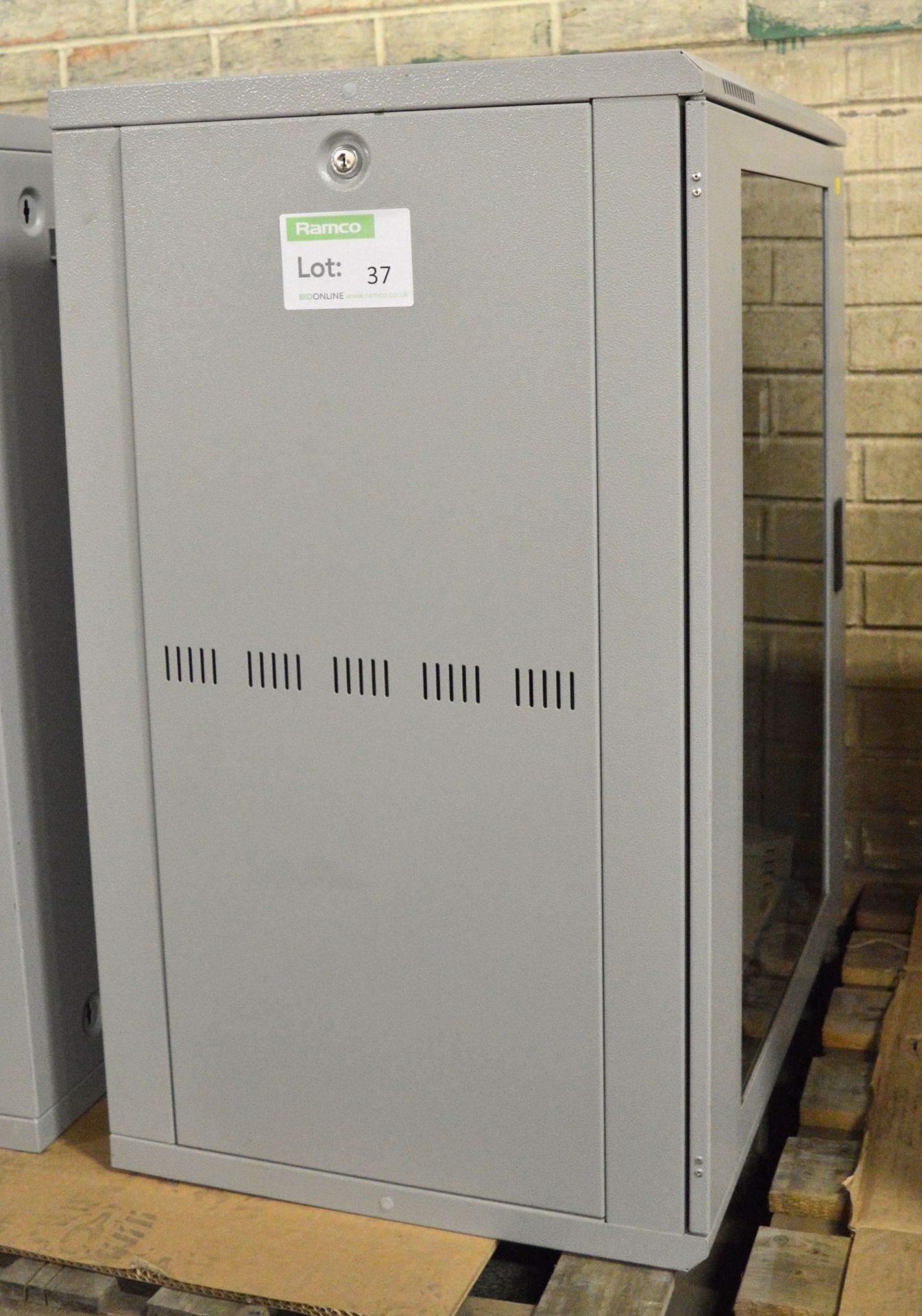 Cabinet with 19" Rack for Electrical Equipment - Some cabling included.