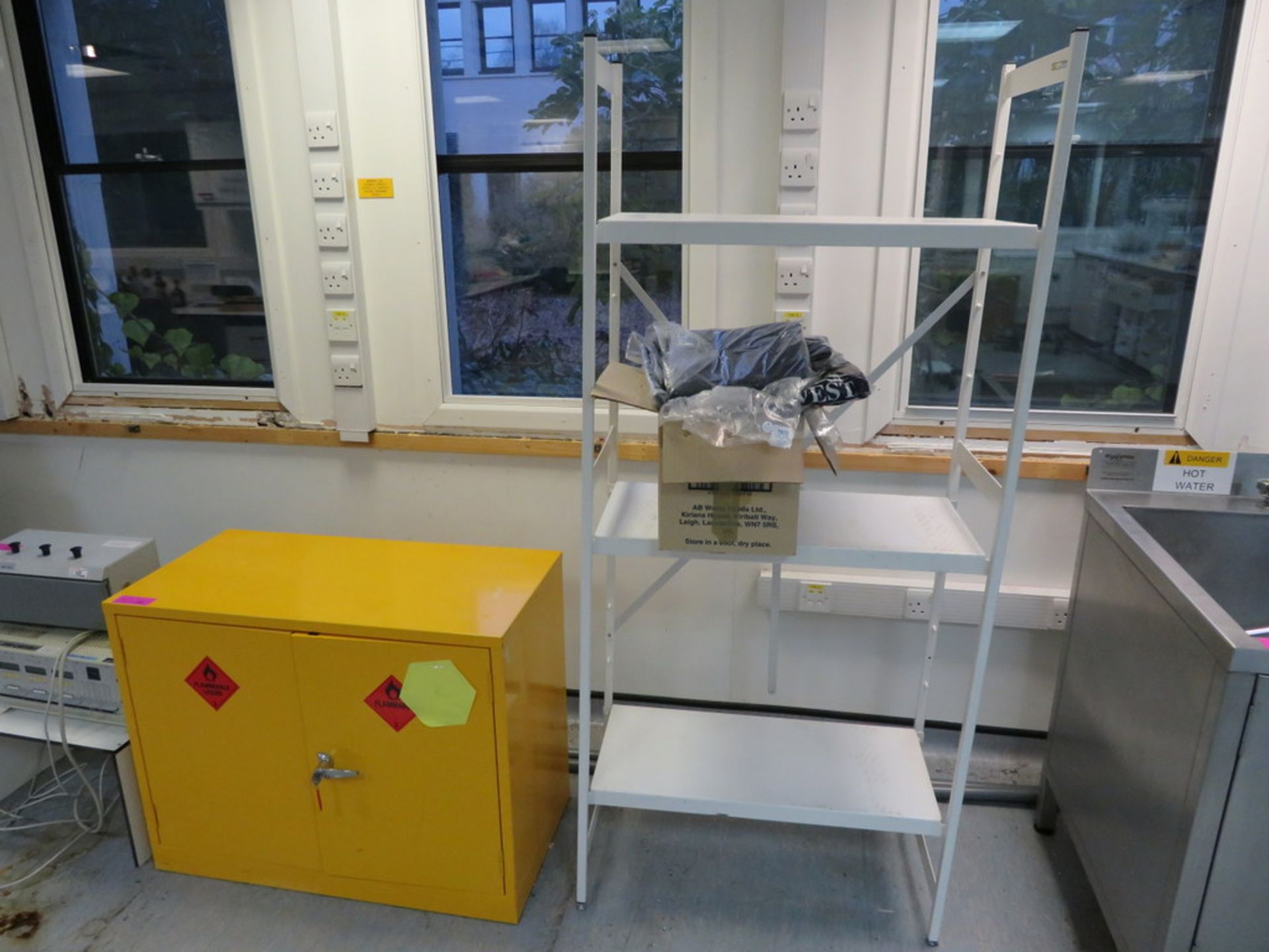 YELLOW METAL FLAMMABLES CABINET, METAL RACK AND UNUSED OVERALLS