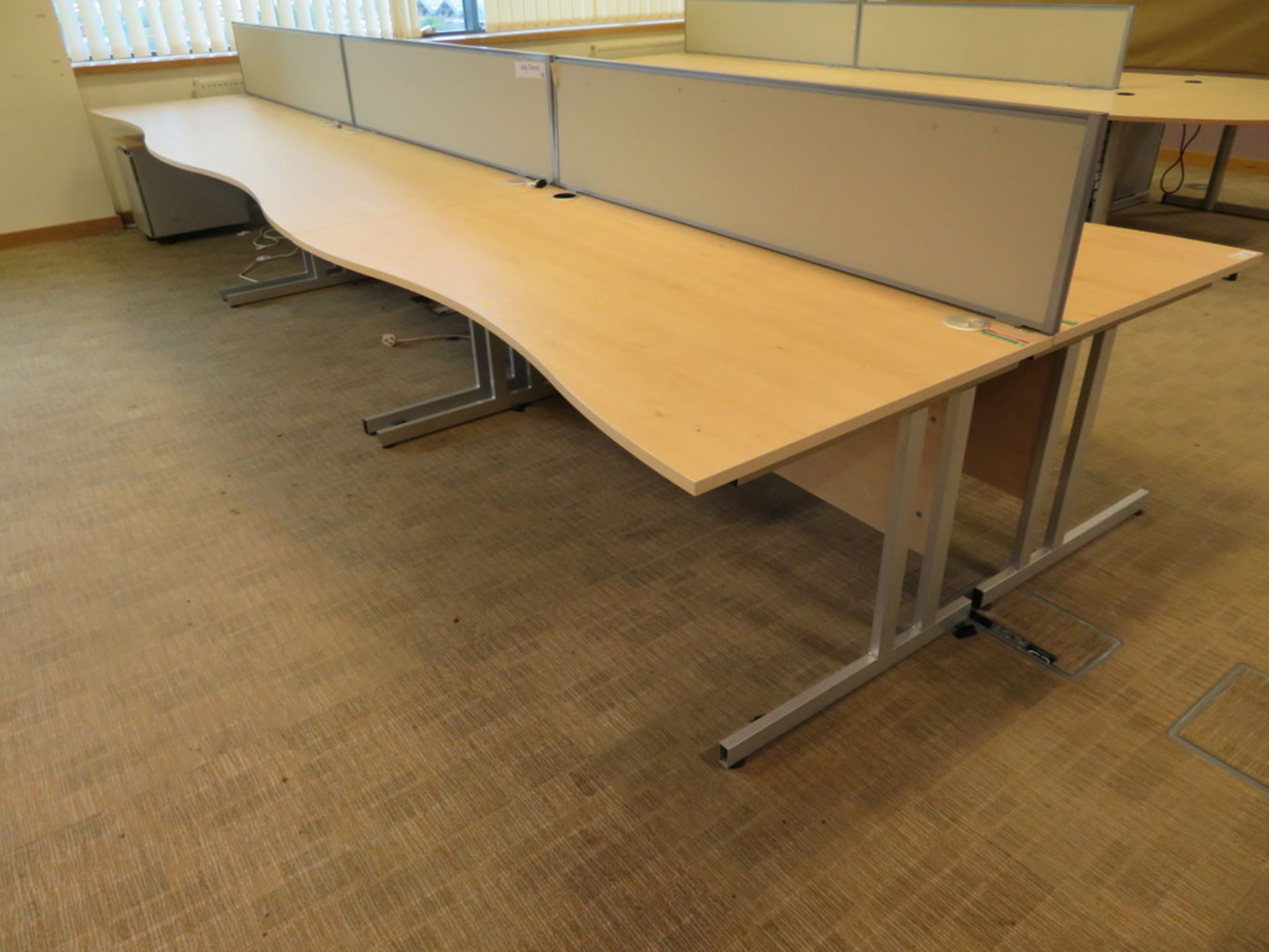 6 X LIGHTWOOD EFFECT CURVED FRONT OFFICE DESKS AND 3 X DESK DIVIDERS