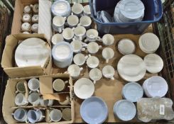 Assorted cups, saucers, plates.