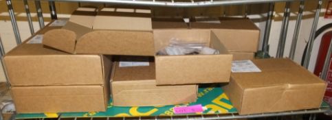 11 boxes of plastic buckle sets - 7000327 & 7000462 - 10 per box