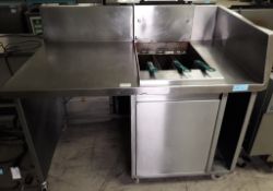 Pitco SG18DI 3 pan gas fryer with built in work station.