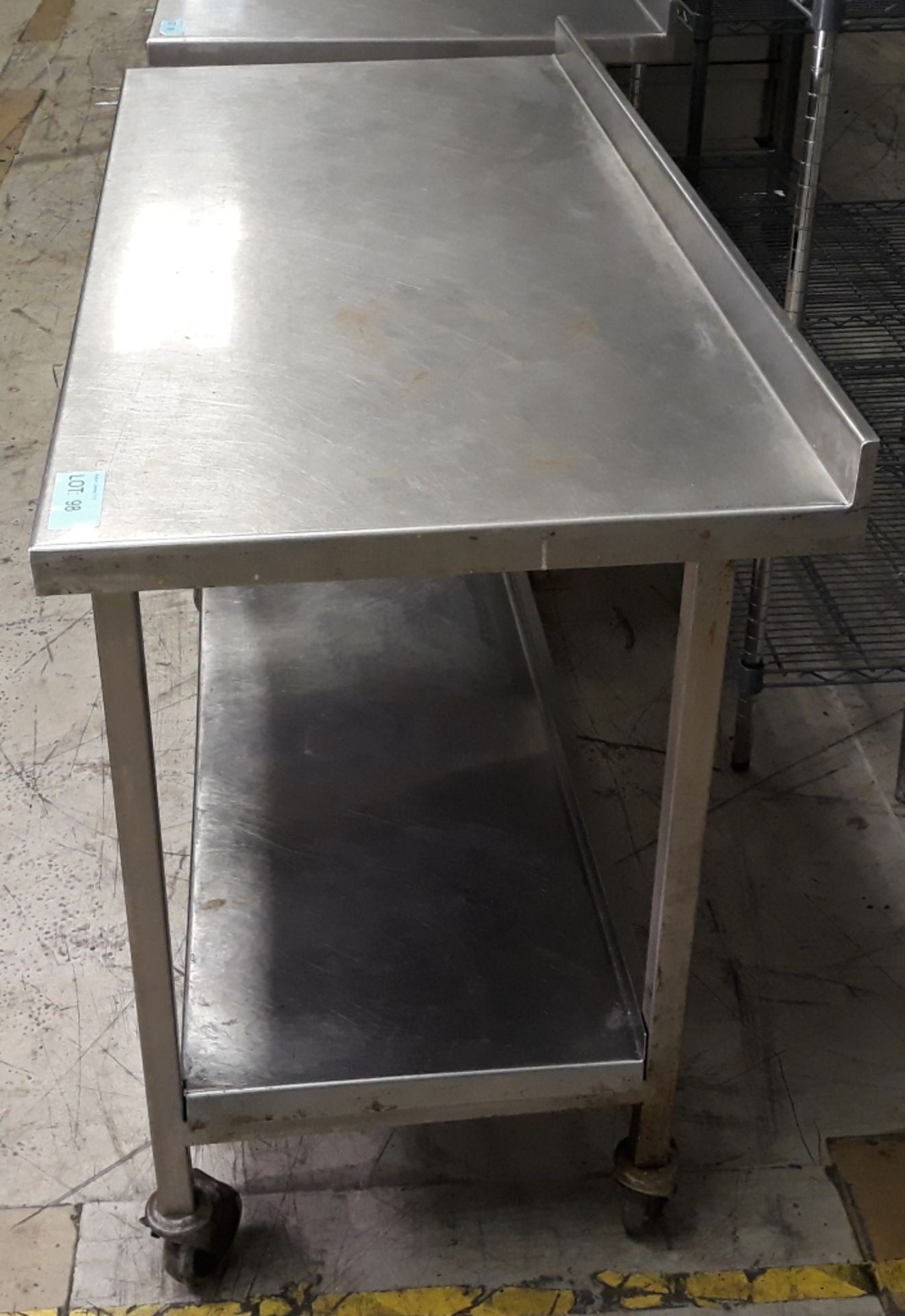 Stainless steel table on wheels - 130 x 60cm. - Image 2 of 2