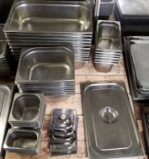 39 mixed sized gastronorm containers.