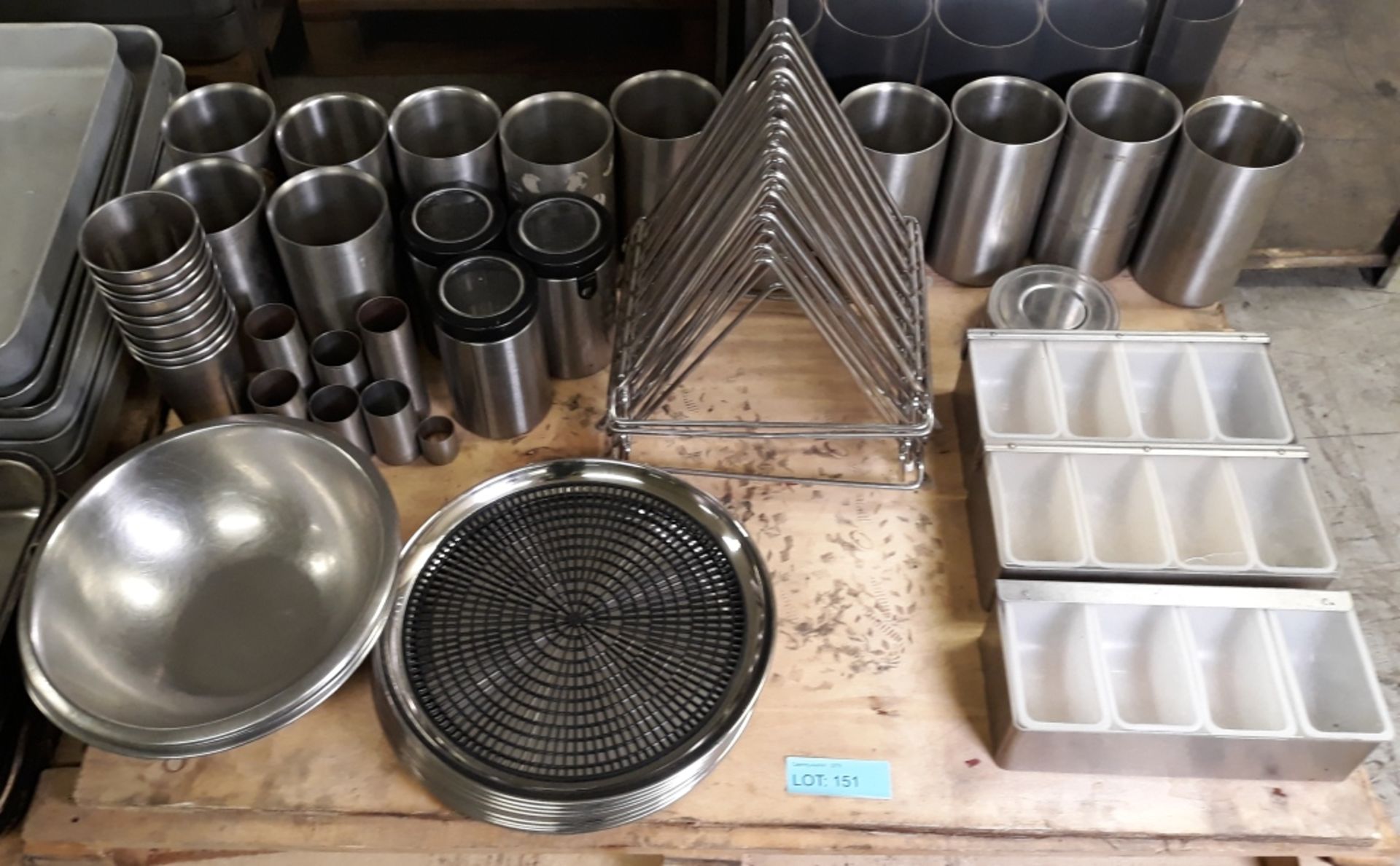 Various storage containers, serving trays, mixing bowls.