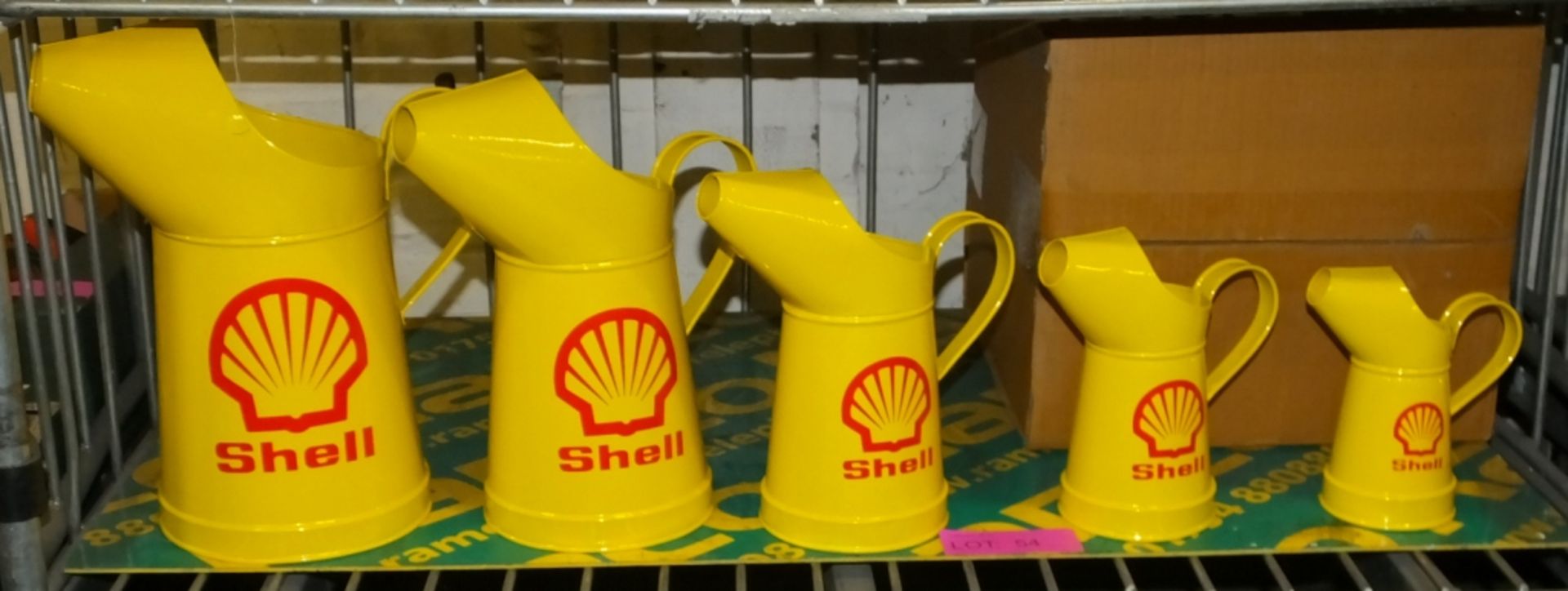 Set 5 of decorative Shell Oil Cans