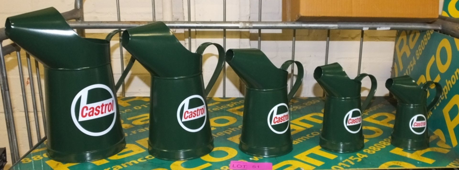 Set 5 of decorative Castrol Oil Cans