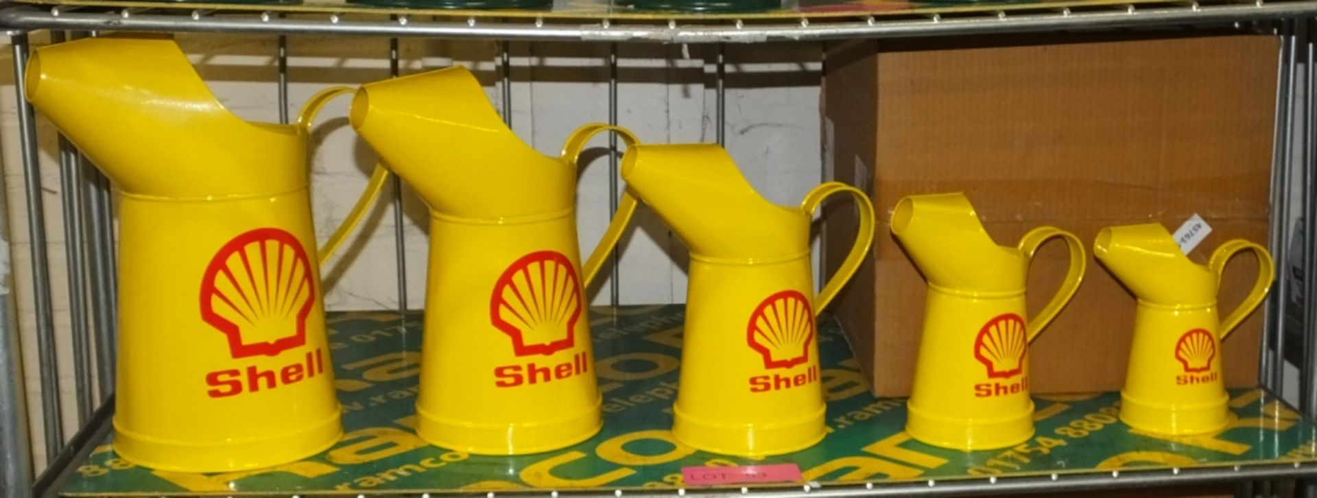 Set 5 of decorative Shell Oil Cans