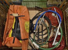 Old Inflatable Rescue Sled. Fire Hoses. Stirrup Pump.