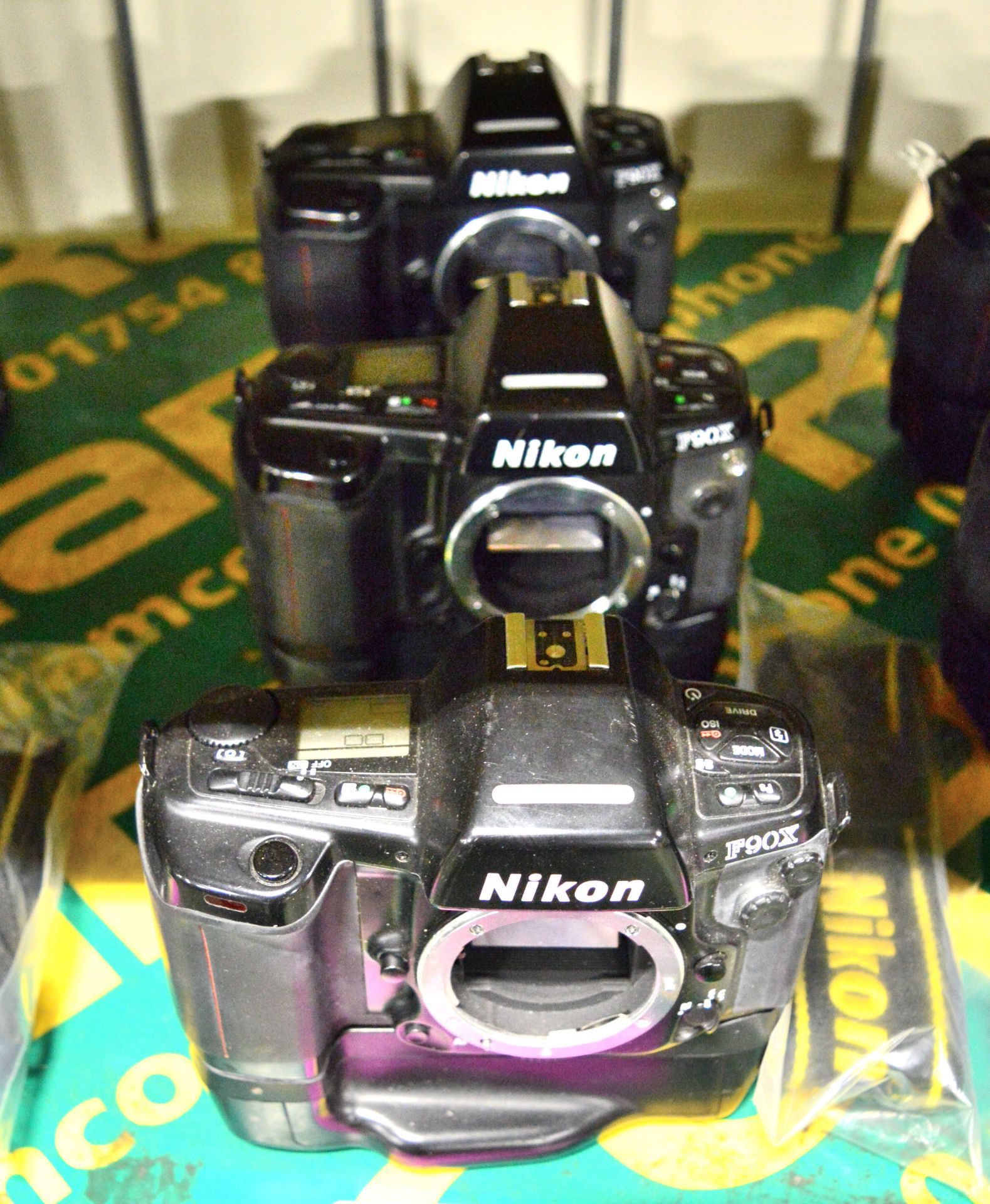 3x Nikon F90X Camera Bodies with Battery Boxes. Strap.