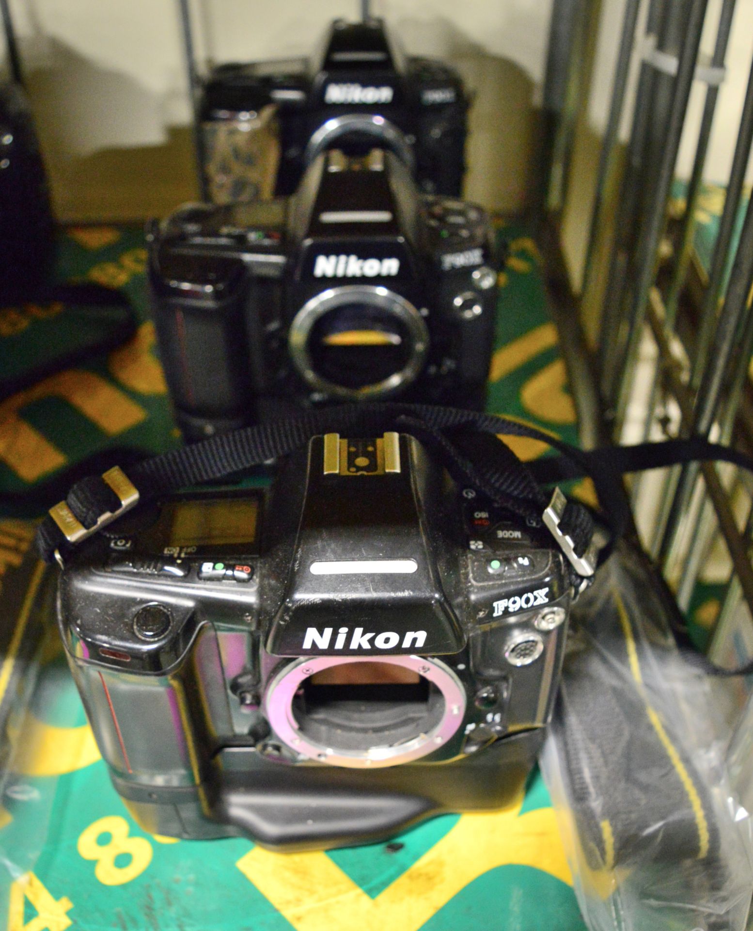 3x Nikon F90X Camera Bodies with Battery Boxes. Strap.