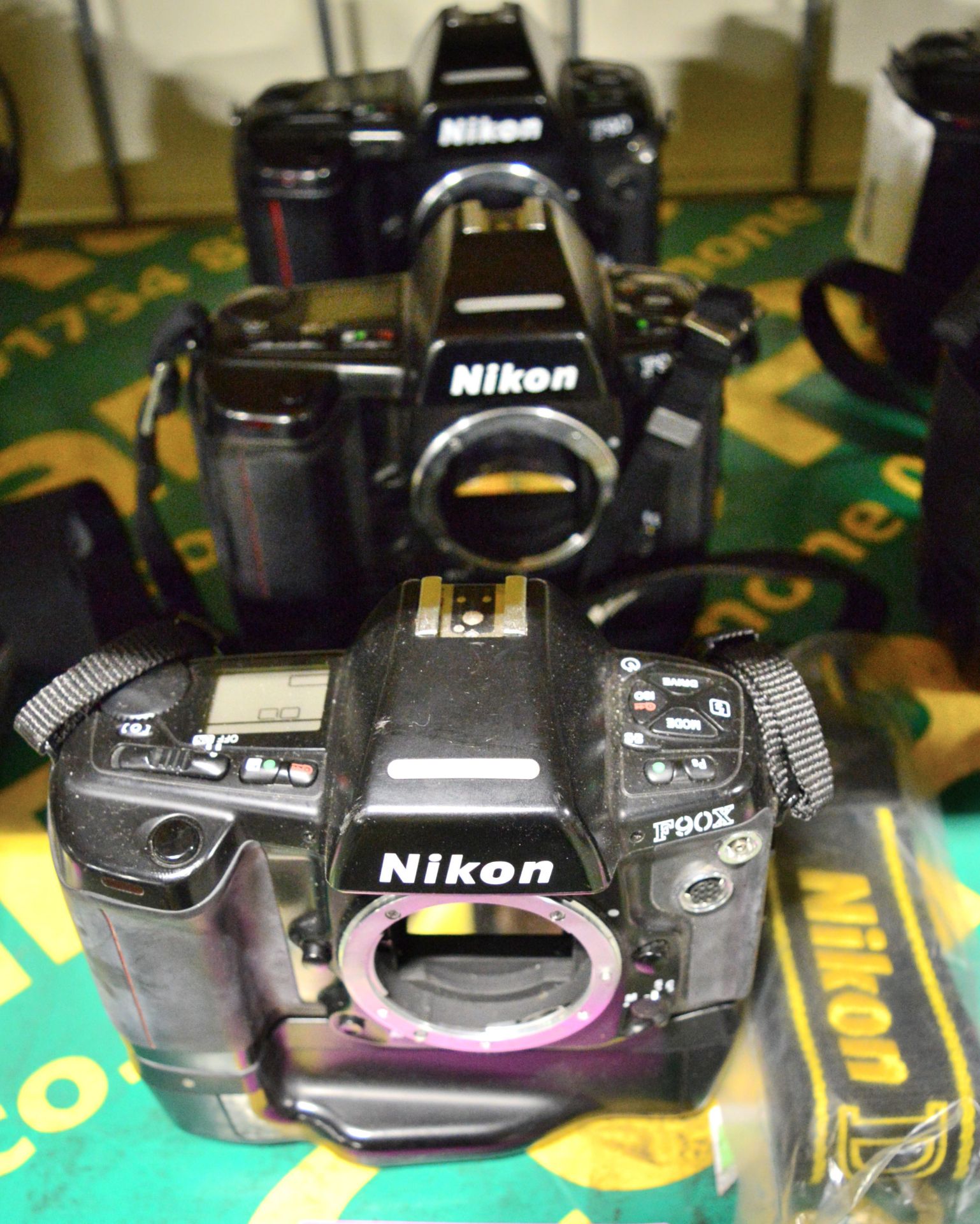 3x Nikon F90X Camera Bodies with Battery Boxes. Strap.