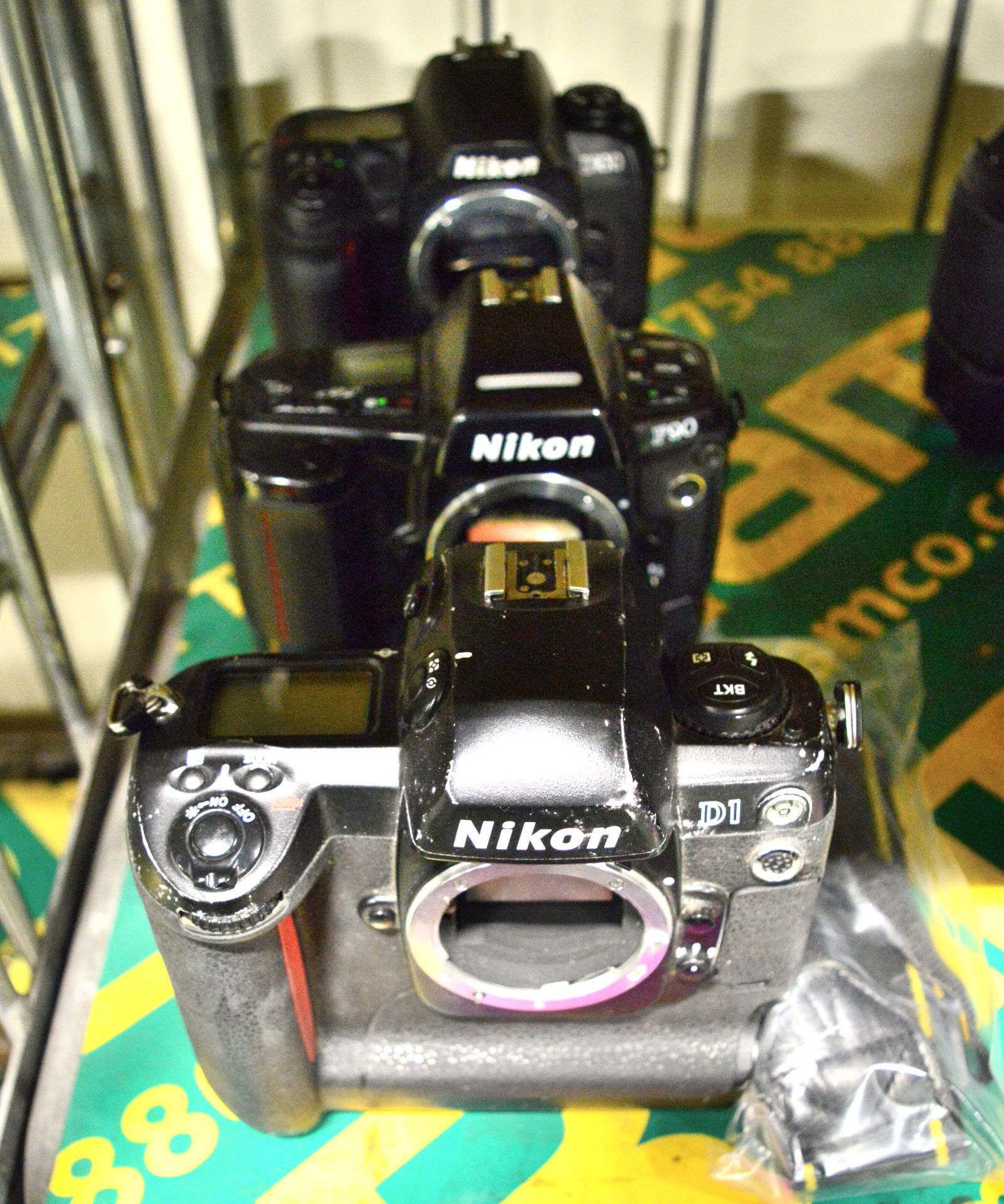 Nikon D1, D100, Digital Camera Bodies with Battery Boxes. Strap. Nikon F90 Camera body