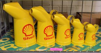 Set of 5 Shell Oil Cans.
