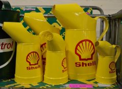 Set of 5 Shell Oil Cans.