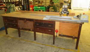 Large work bench complete with DeWalt, Radial Arm Saw, Model: DW 720, Serial Number: 0134.