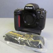 Nikon D1 Camera Body - no battery or cover - comes with D1 Strap