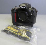 Nikon D1 Camera Body - no battery or cover - comes with D1 Strap