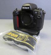 Nikon D1 Camera Body - no battery or cover - comes with D1 Strap