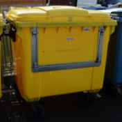 Large Yellow Waste BIn on Wheels.