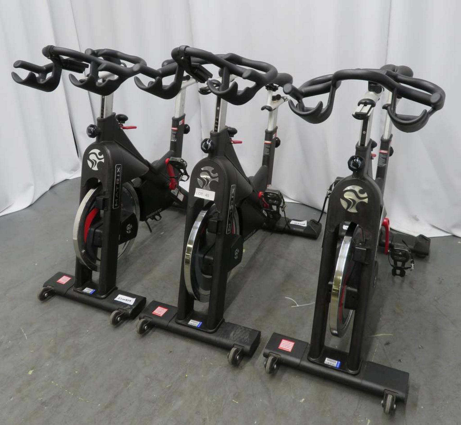 3x Matrix Model: IC3 Series Spin Bike, Complete With Digital Console.