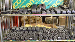 2x Shelves of Tait Walkie Talkies & Batteries.