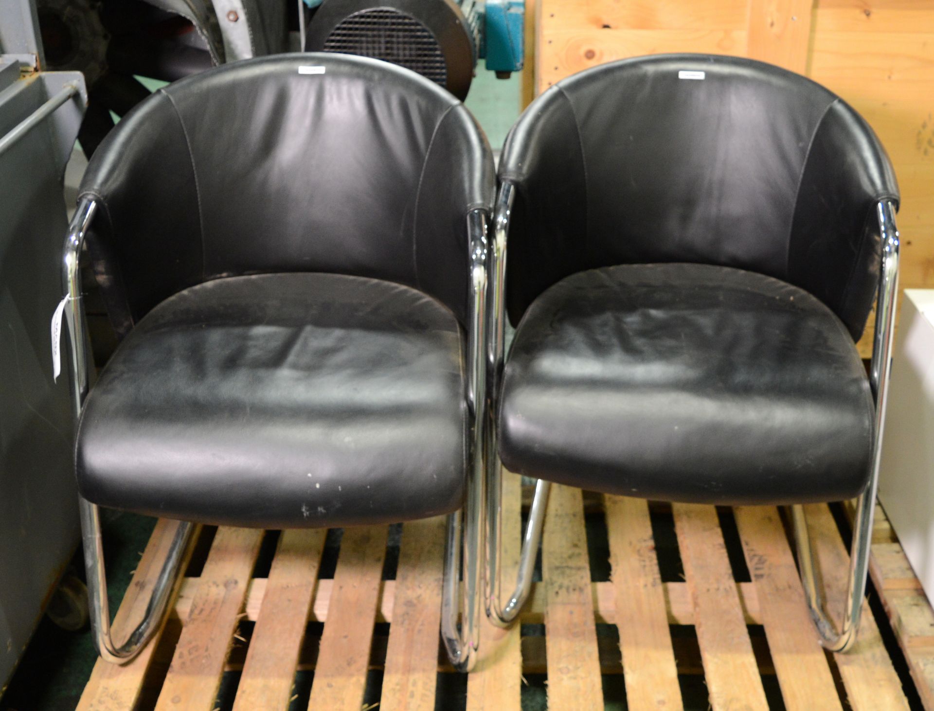 2x Leatherette Chairs with Chrome Bases.